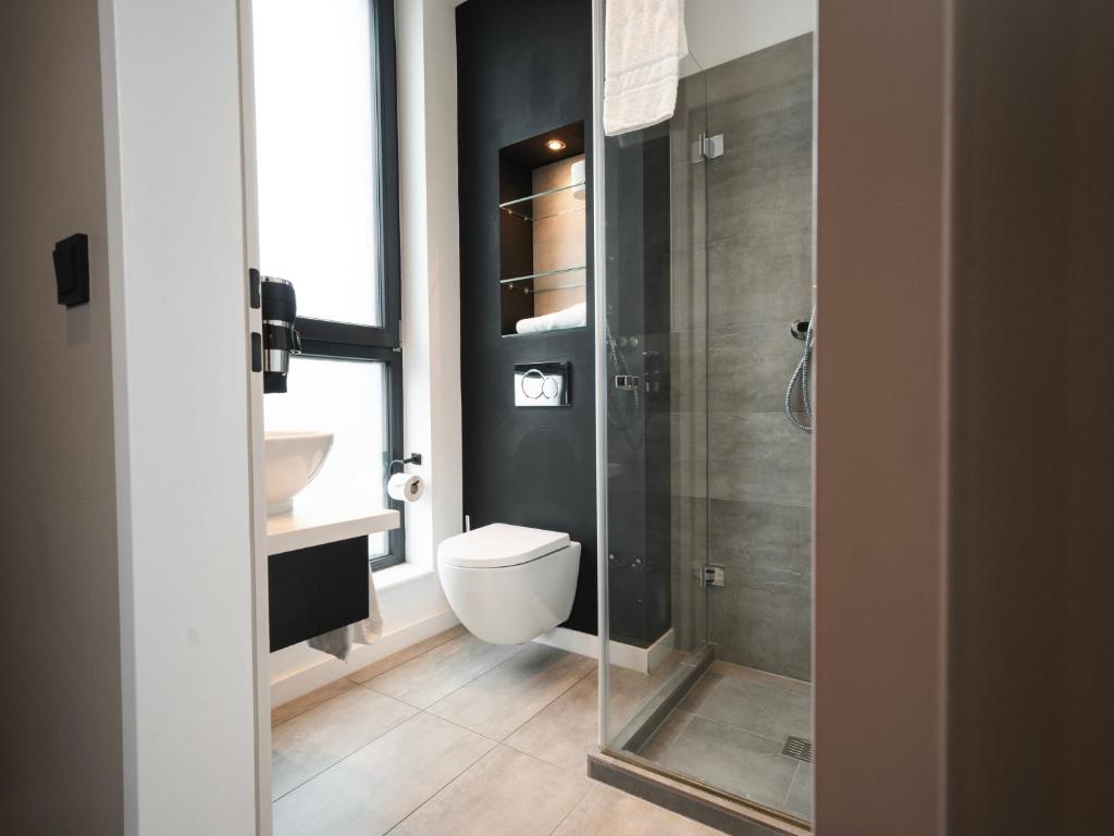 JustStay Grevenbroich Hotel & Apartments - Tap to explore photos