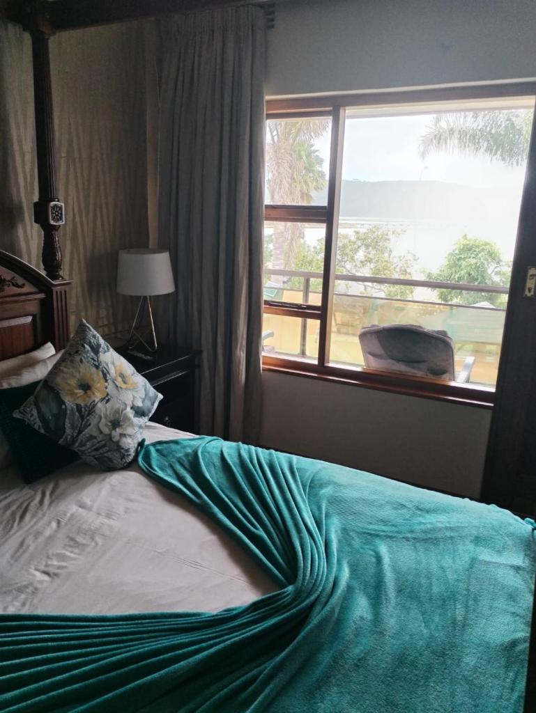 Lagoon Breeze Guest House Room Type - Deluxe Double Room with Balcony and Sea View Lagoon Breeze Guest House Room Type - Deluxe Double Room with Balcony and Sea View
