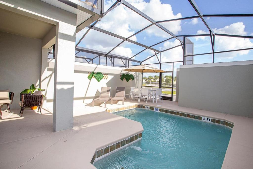 Gorgeous 4 Bedroom w Pool Close to Disney 4836 image