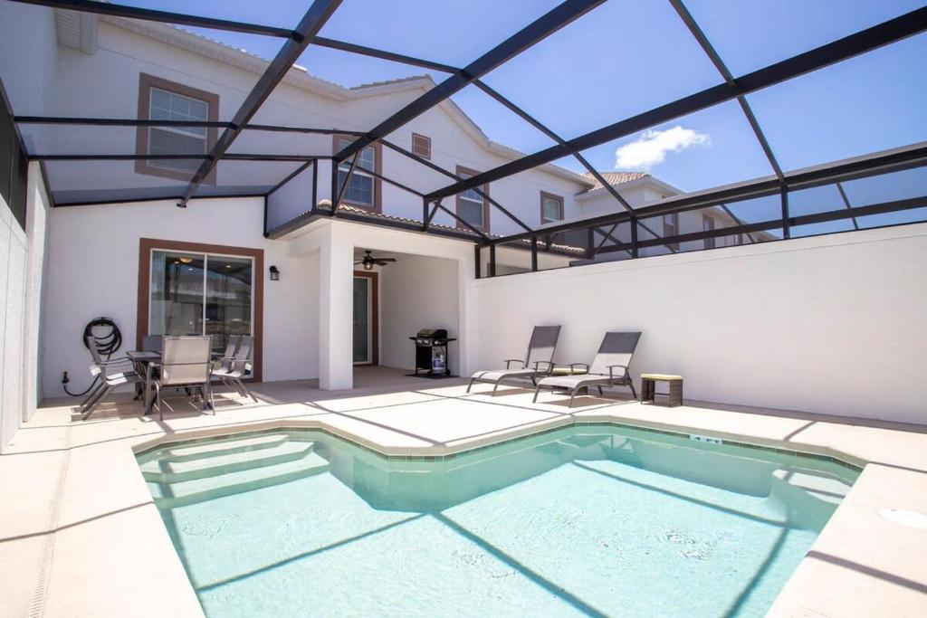 Ravishing Four Bd w/ Pool Close to Disney 4947 image