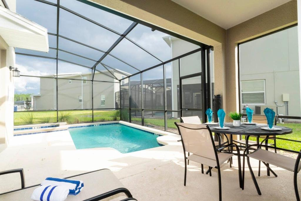 Stunning Family Friendly 5 Bd w Pool Close to Disney Storey Lake 4242 image