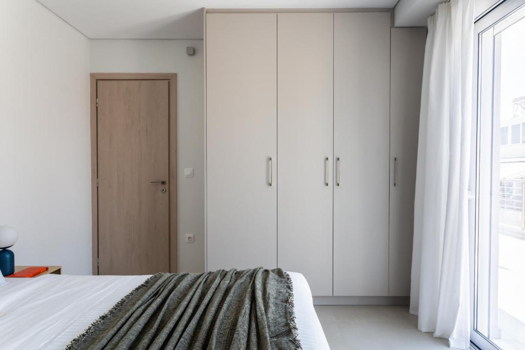 Tranquil 2BR Apartment with Acropolis view by UPSTREET - Tap to explore photos