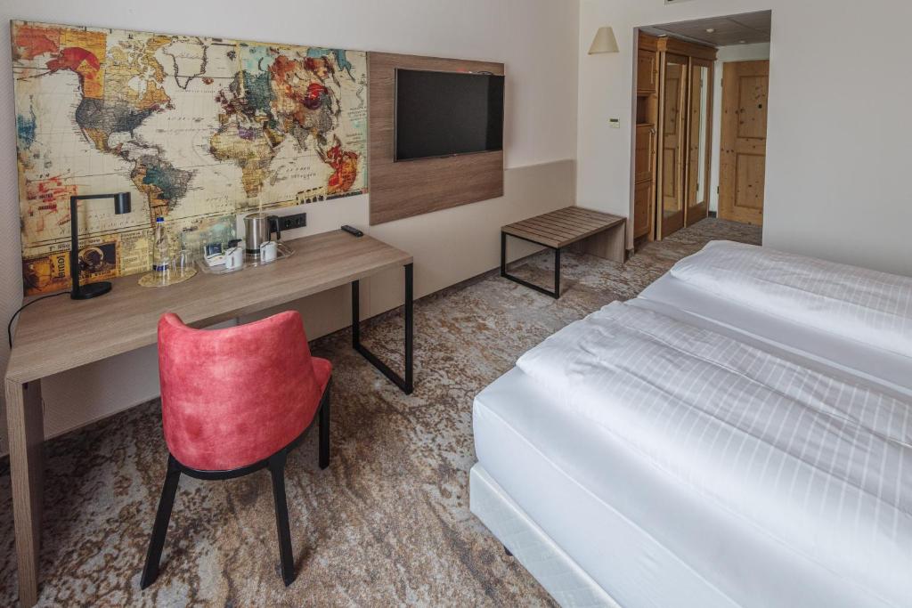 Atomis Hotel Munich Airport by Mercure - Tap to explore photos