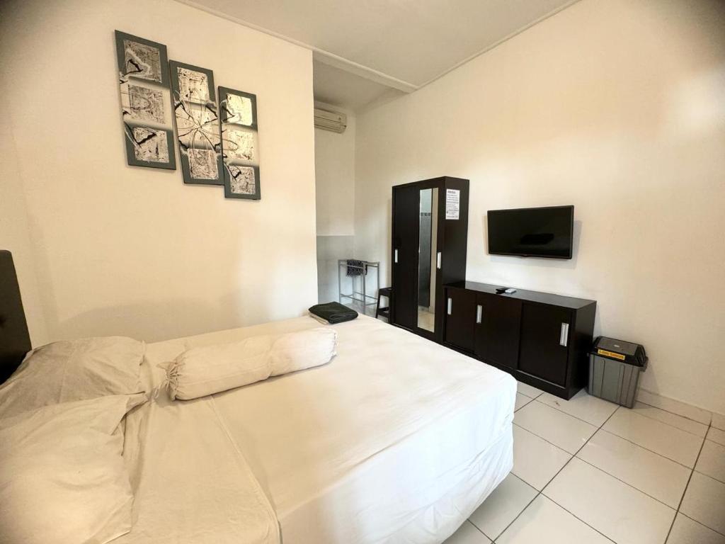 OYO 90053 Paradise Inn Room Type - Standard Room