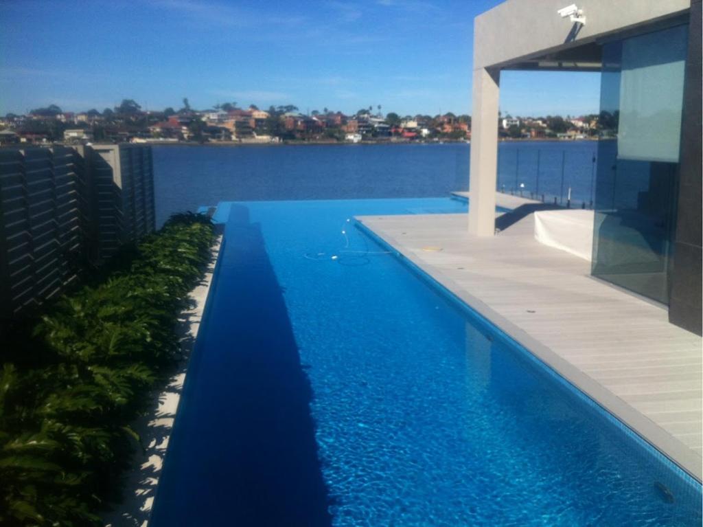 Waterfront Oasis ,Panoramic Views, Infinity Pool photo 1