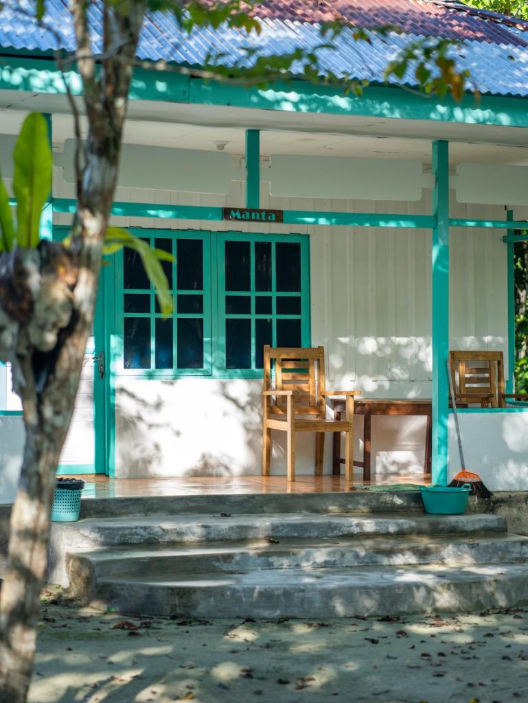 Scuba Republic Beach Bungalows - Tap to explore photos