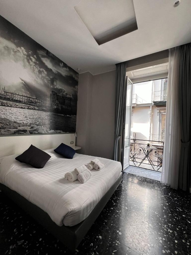 Beverello Rooms - Tap to explore photos
