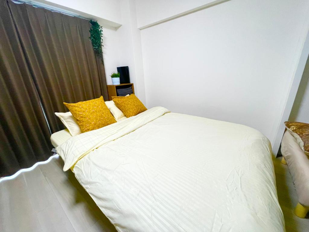 SUNRISE APT ワンちゃんといっしょにご宿泊可能 新大阪駅から徒歩5分観光都市へのアクセス抜群Simply Guest Room Shin-Osaka - Tap to explore photos