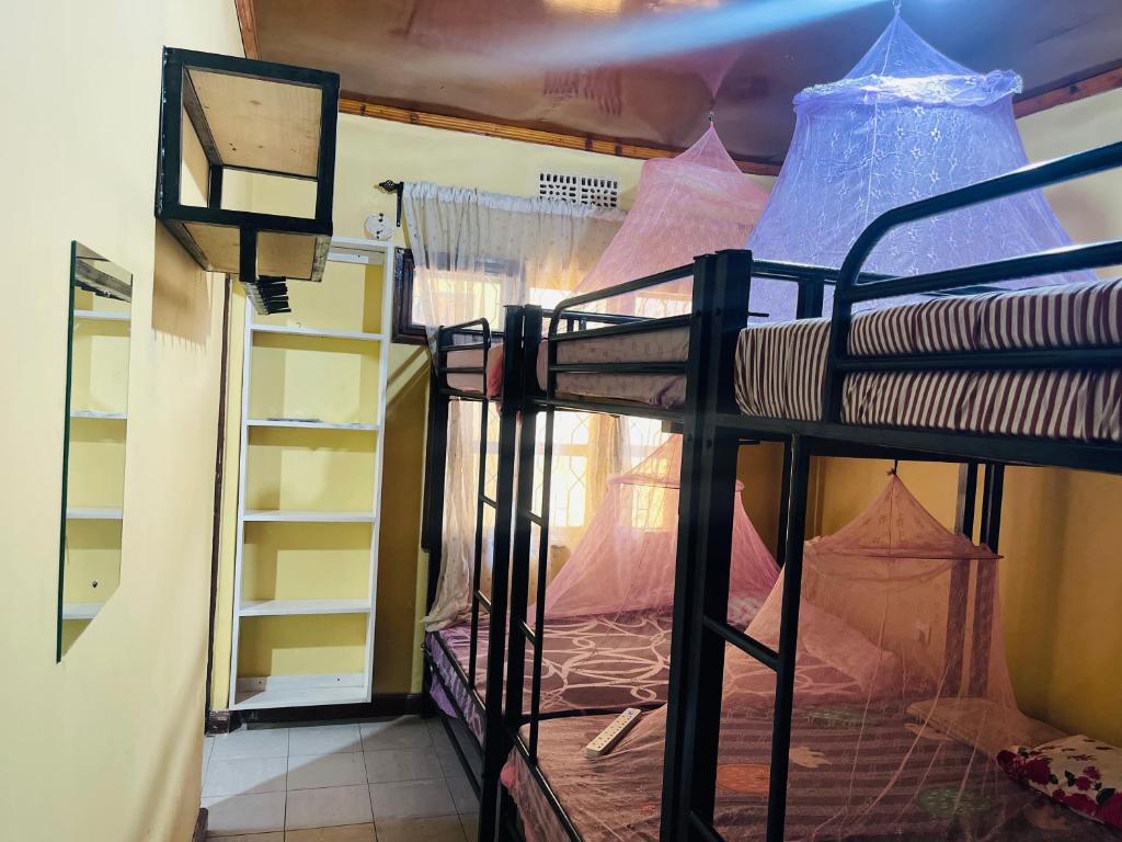 Amani Homestay - Tap to explore photos