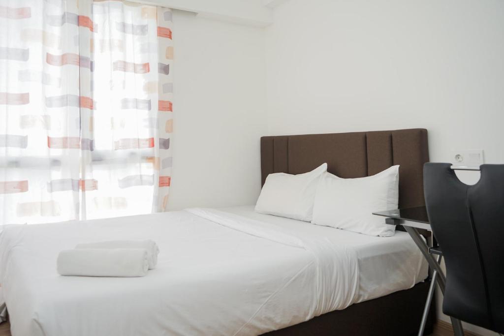 Comfort 2BR at Sky House BSD Apartment By Travelio
