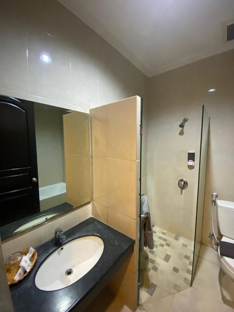 Hotel 88 Diponegoro Jember by WH - Tap to explore photos