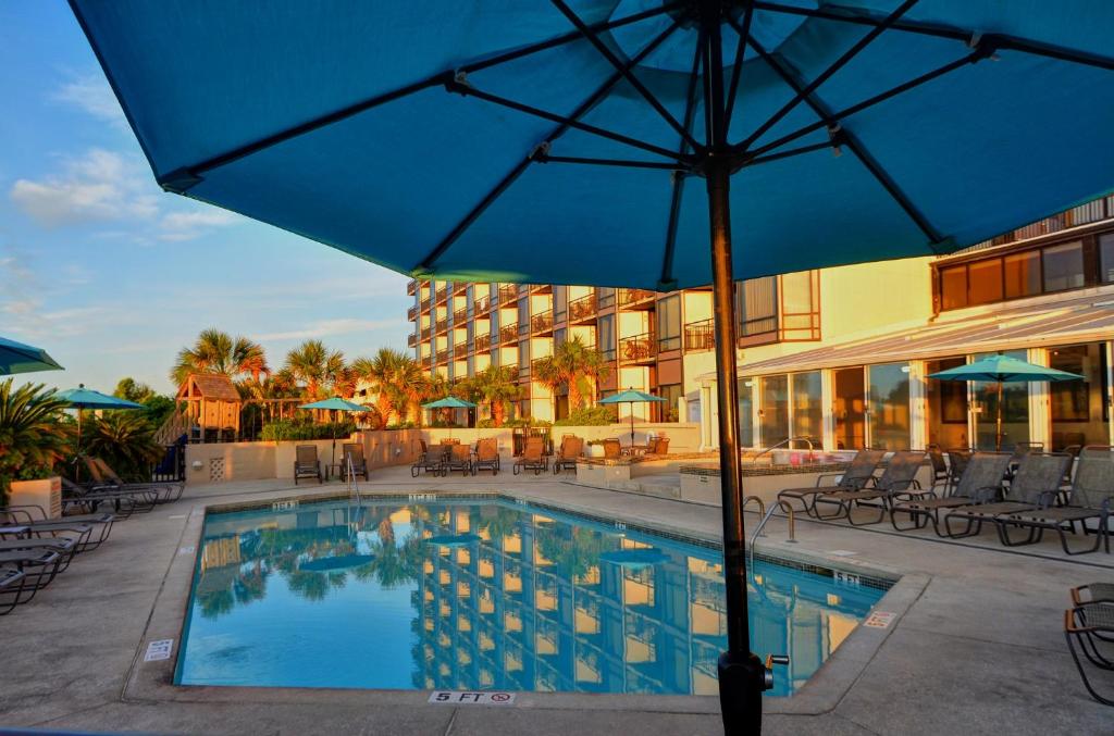 Shell Island Resort - All Oceanfront Suites - Tap to explore photos