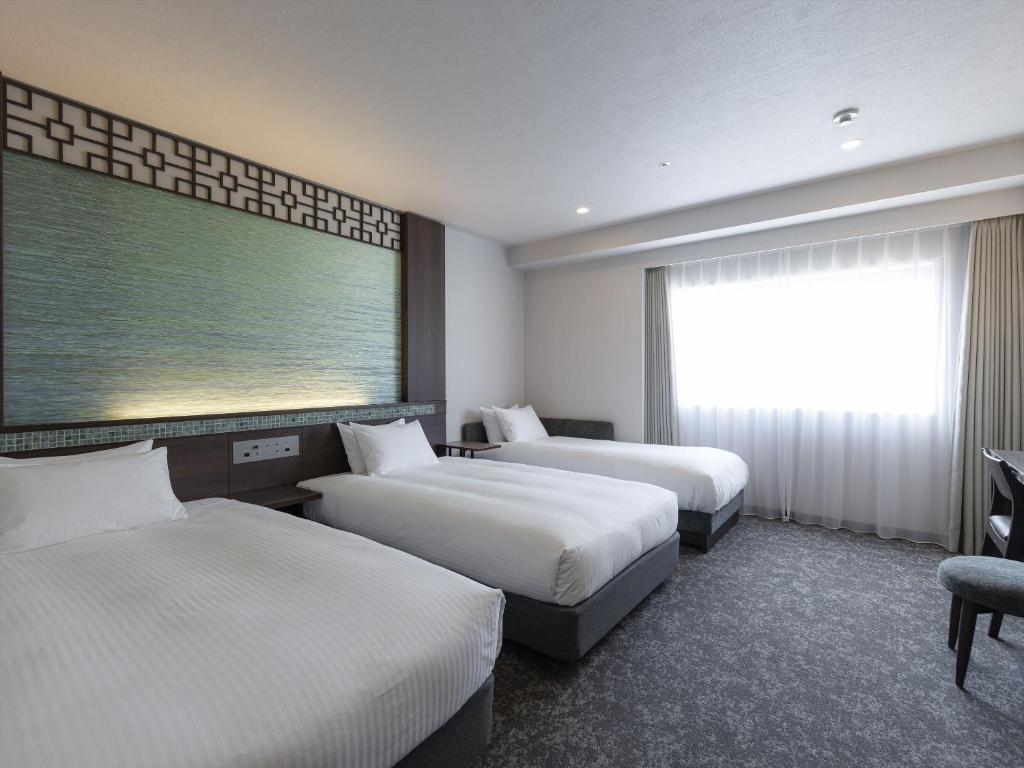 JR KYUSHU HOTEL Nagasaki Room Type - Superior Twin Room 3 Adult - Non-Smoking JR KYUSHU HOTEL Nagasaki Room Type - Superior Twin Room 3 Adult - Non-Smoking