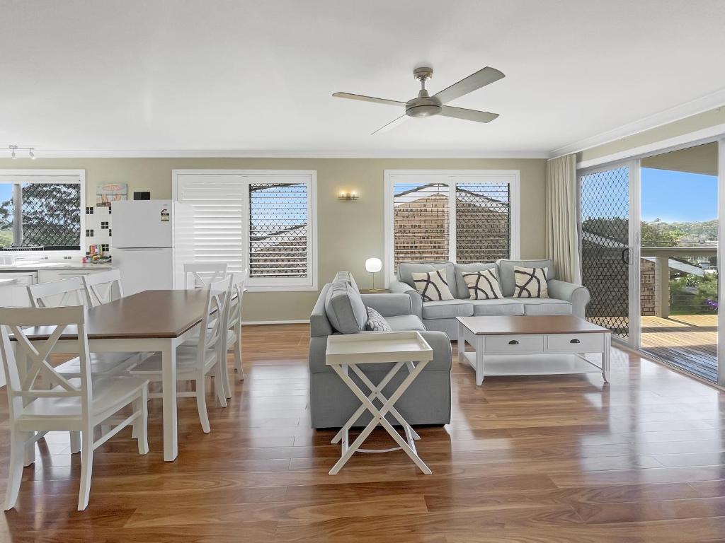Coastal Upper-Level Home with Shared Pool Access photo 2