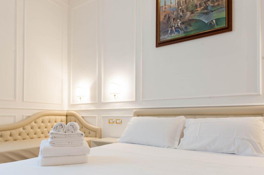 Navona Central Suites - Tap to explore photos