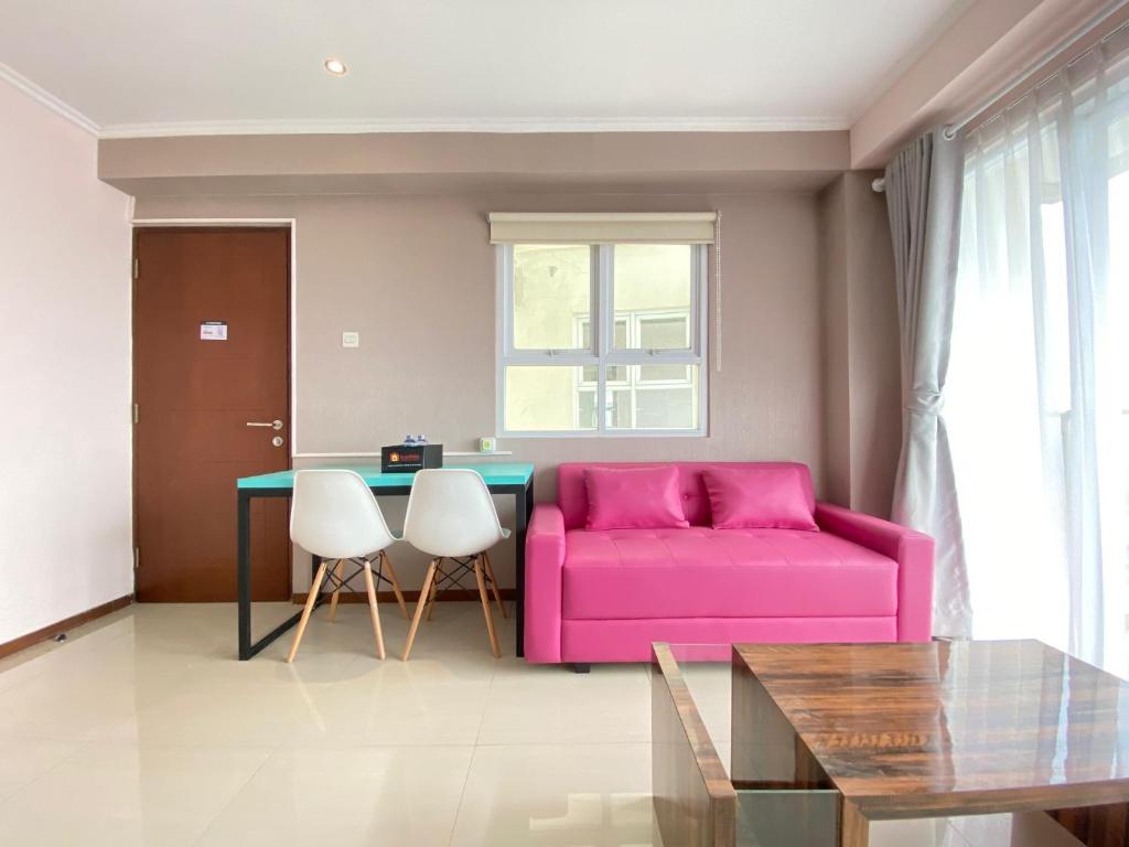 Modern & Cozy 2BR at Gateway Pasteur Apartment By Travelio - Tap to explore photos