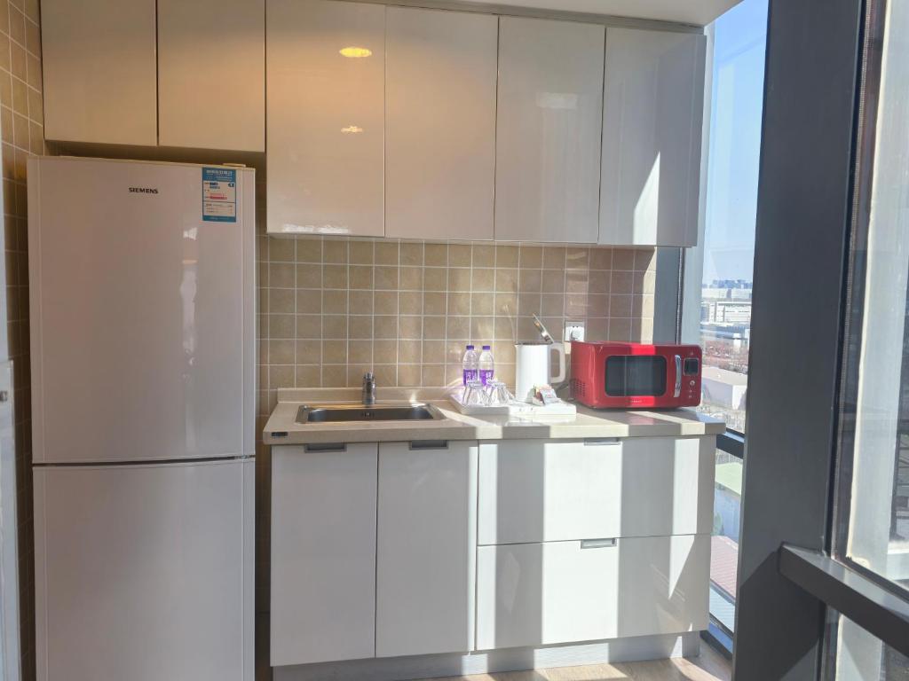 Holiday Inn Express (Beijing Yizhuang) - Tap to explore photos