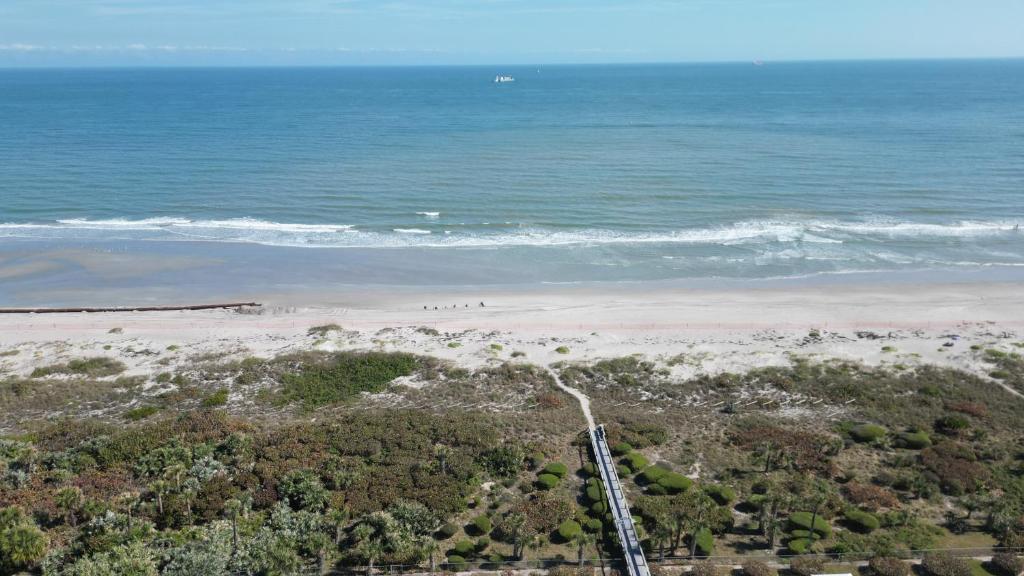 Enchanting 2-Bedroom Ground Floor Beach Condo at Cape Canaveral WiFi & AC image