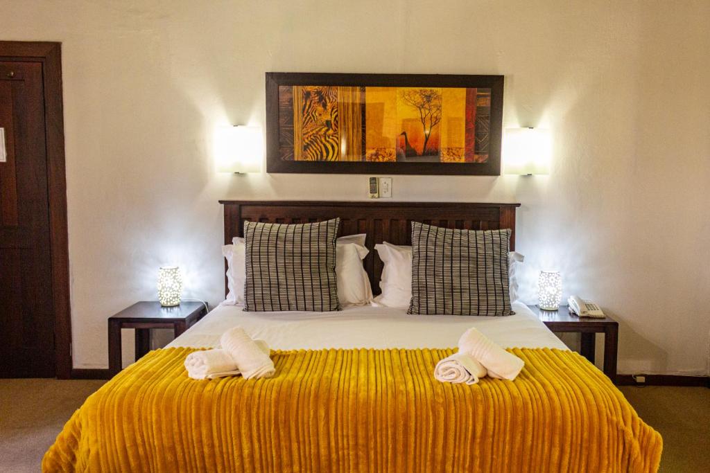 Hotel Numbi and Garden Suites - Tap to explore photos
