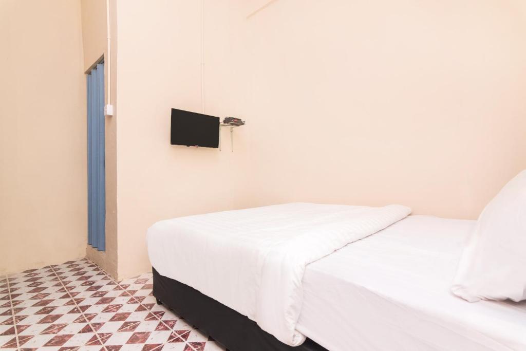 OYO Life 2583 Kost Anggun photo 4