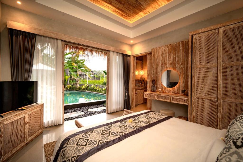 The Macaw Ubud Green Uma Villa photo 4