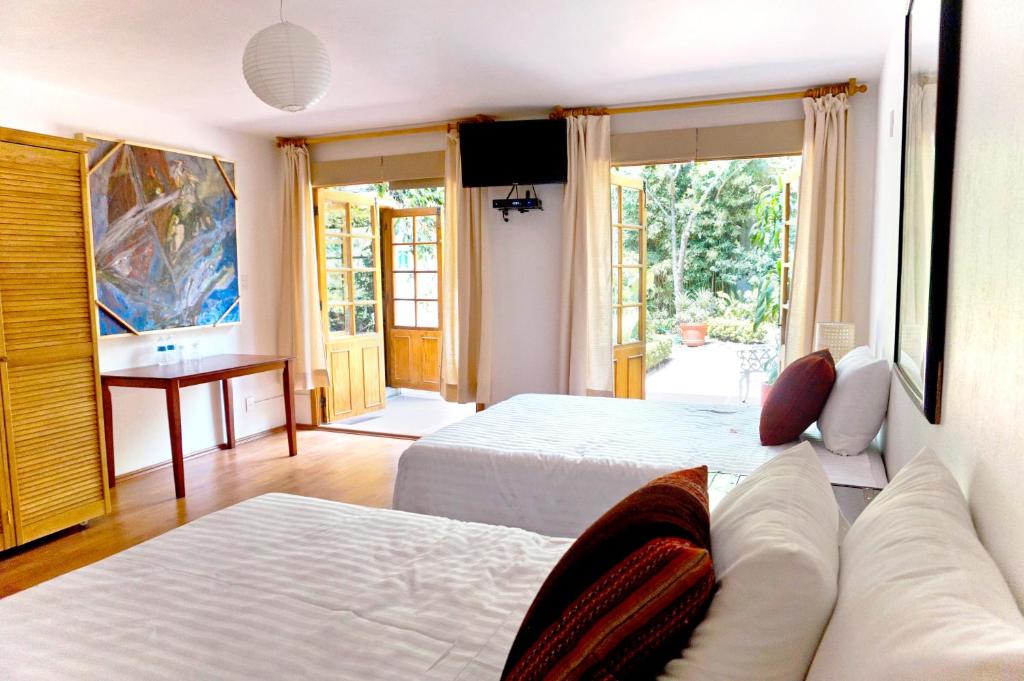 Двухместный (Двухместный номер с 2 двуспальными кроватями), Casa Jacinta Guest House