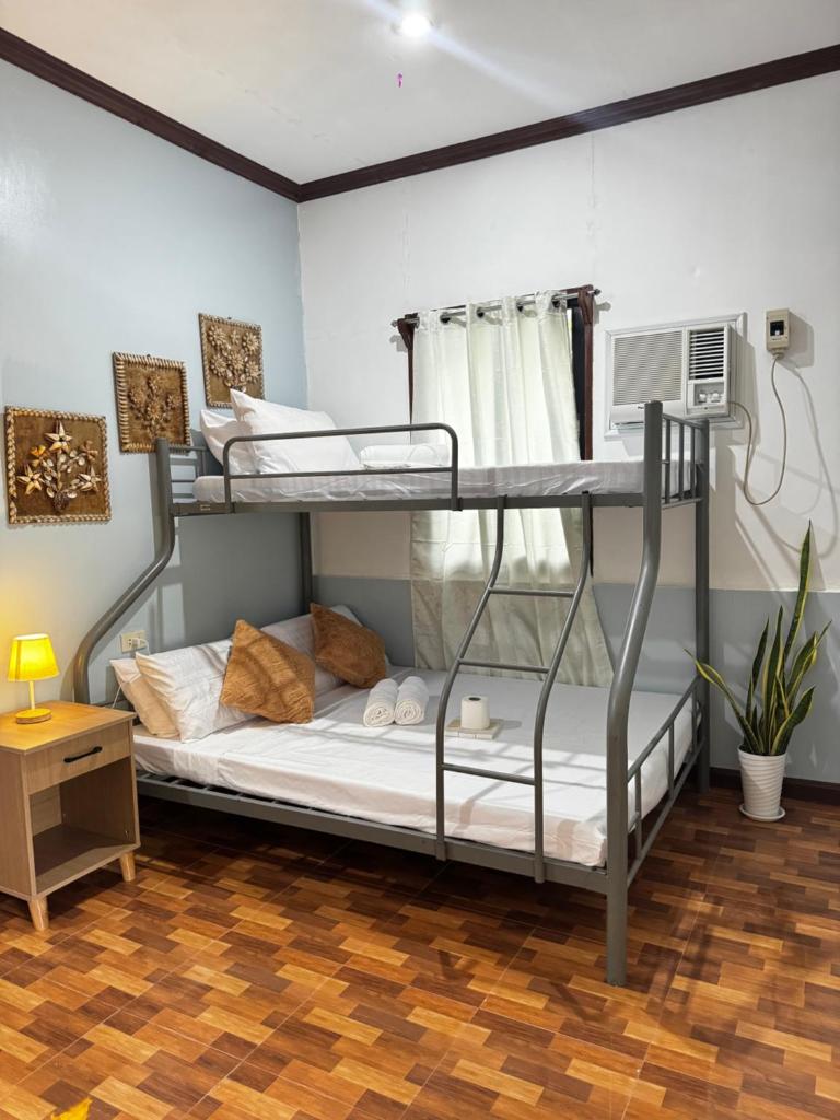 Cecilia's Garden Guesthouse Room Type - Triple Room with Terrace