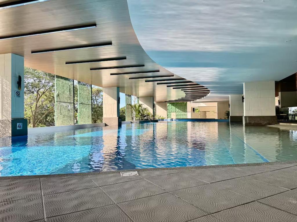 2Br QC Furnished Condo w 300mbps Net Free Pool Use