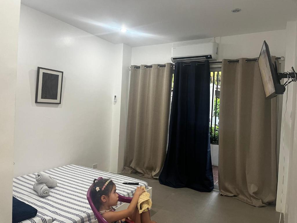 Villa Talisay Kaputian - Streetside Studio - Tap to explore photos