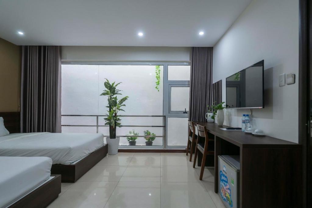 Coco Tuan Chau Hotel - Tap to explore photos