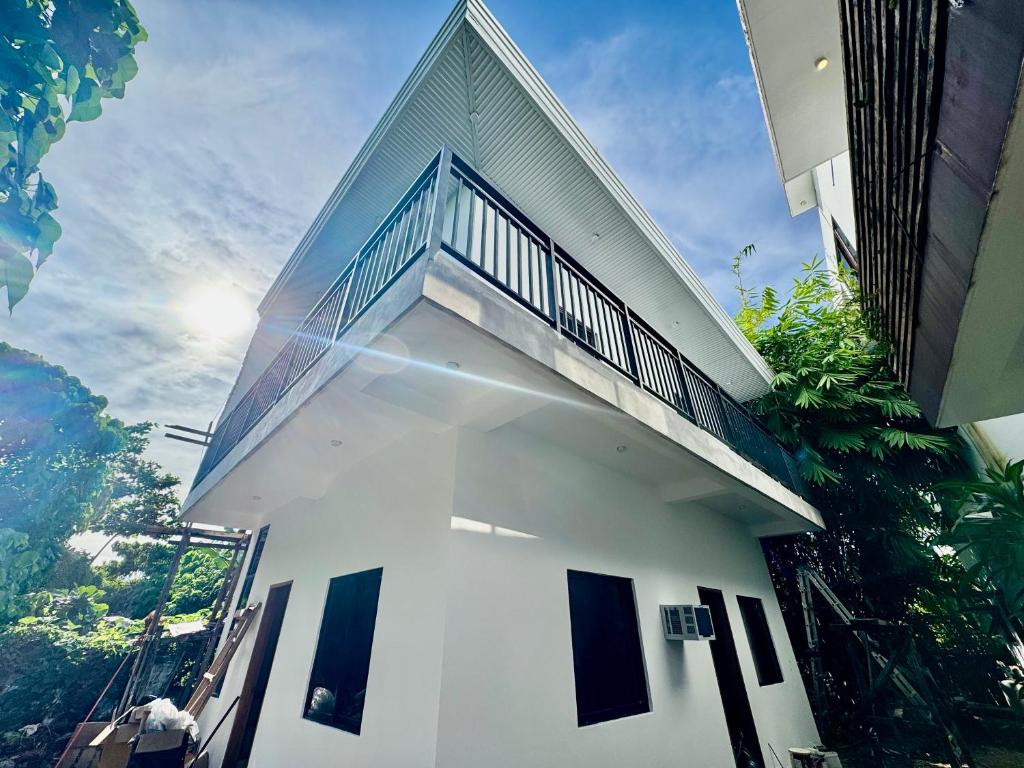 Cozy Family Studio - Ronaldos Inn Twinex Suite, Siargao