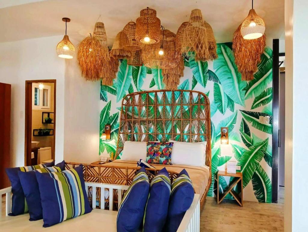 Suites by Eco Hotels - Tap to explore photos