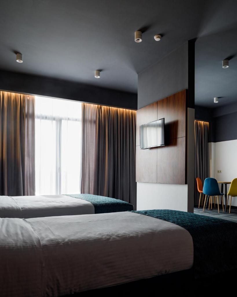 Address Inn Tbilisi - Tap to explore photos