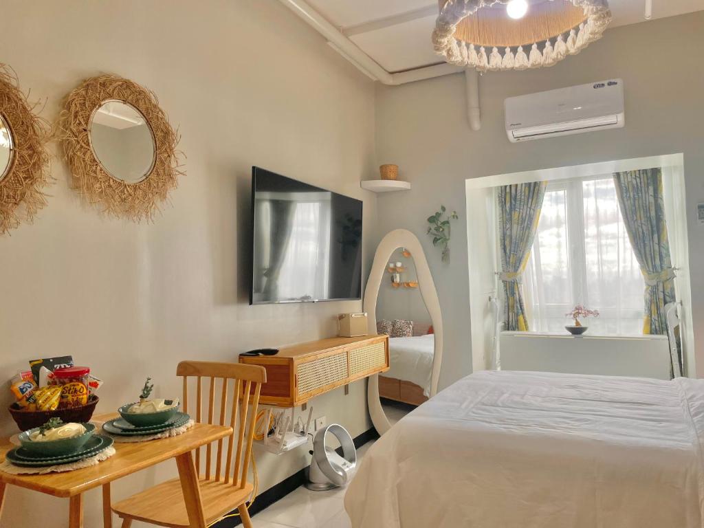 Serene Haven in Tomas Morato - Tap to explore photos