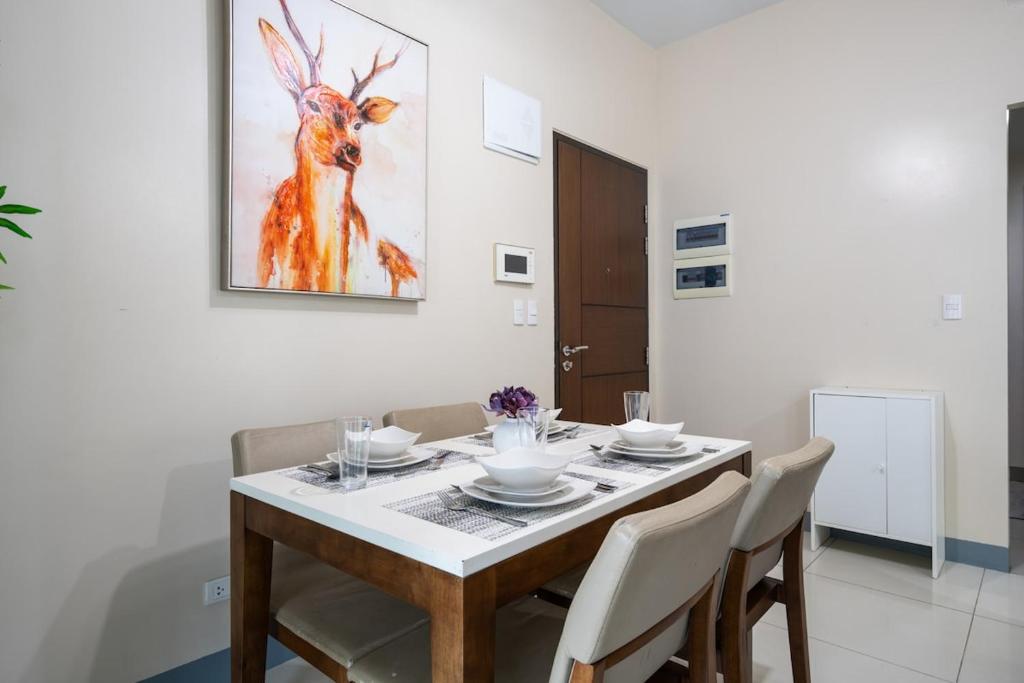 One Uptown Residence BGC 2BR Cor unit with balcony ,washer - Tap to explore photos