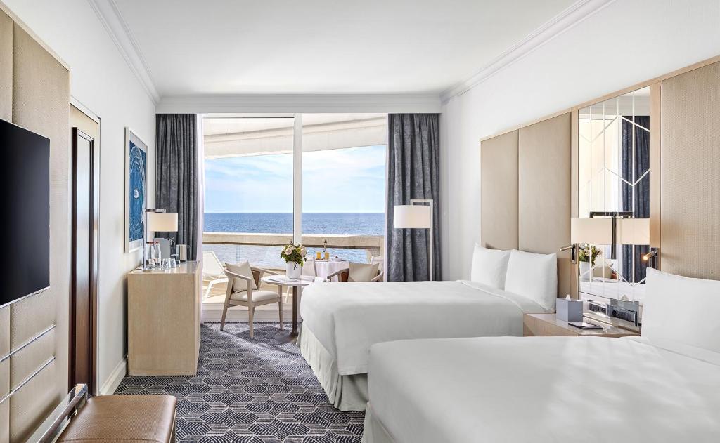 Fairmont Monte Carlo Room Type - Signature Double Room with Two Double Beds and Sea View Fairmont Monte Carlo Room Type - Signature Double Room with Two Double Beds and Sea View