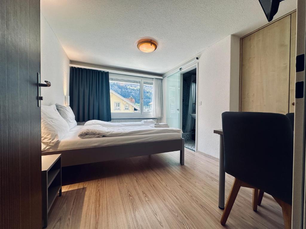 Hotel Rebstock Meiringen - Tap to explore photos