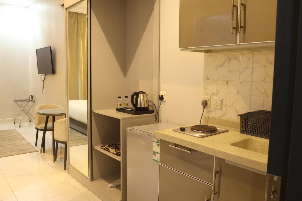 Areen Al Naeem Served Apartments - Tap to explore photos