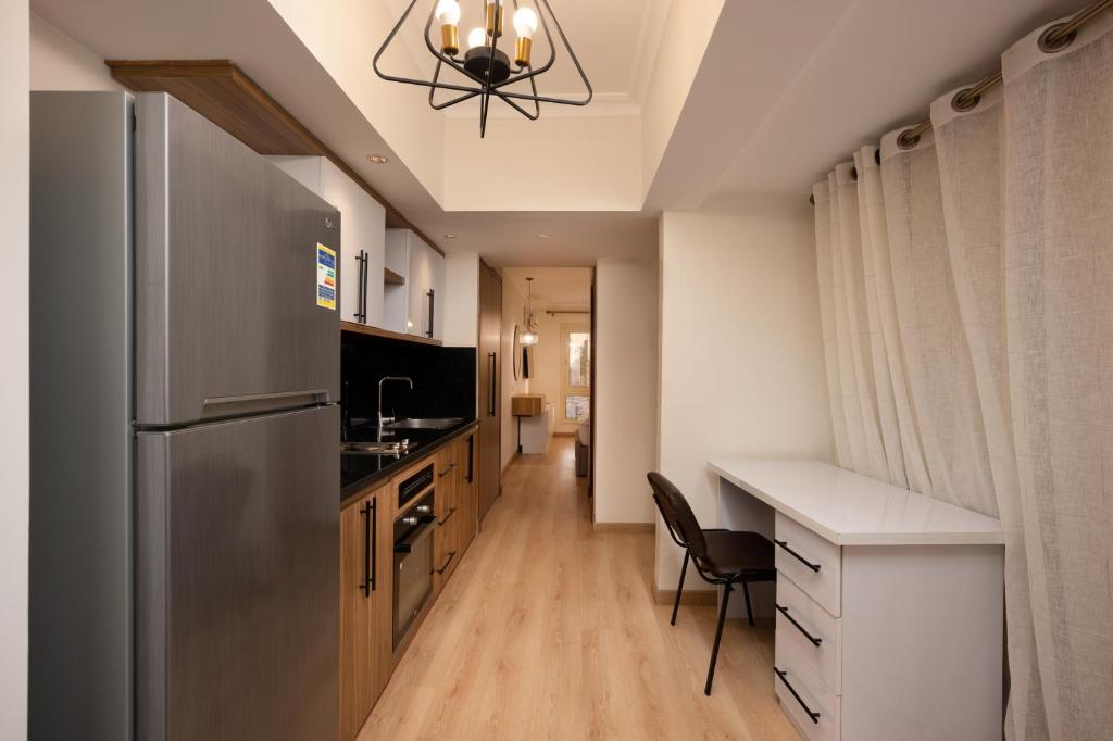 Belvira Residence - Self Check-in, Modern Studio Apartments in New Cairo - Tap to explore photos