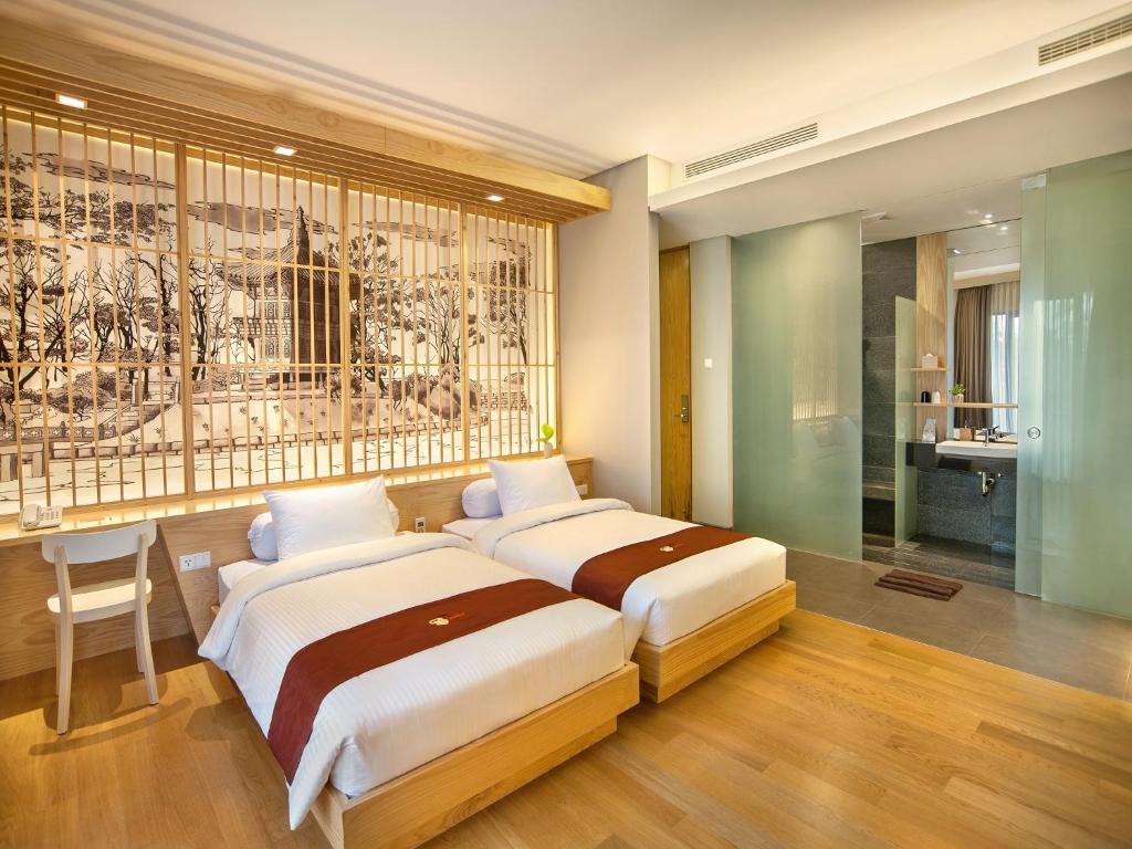 Tama Boutique Hotel - Tap to explore photos