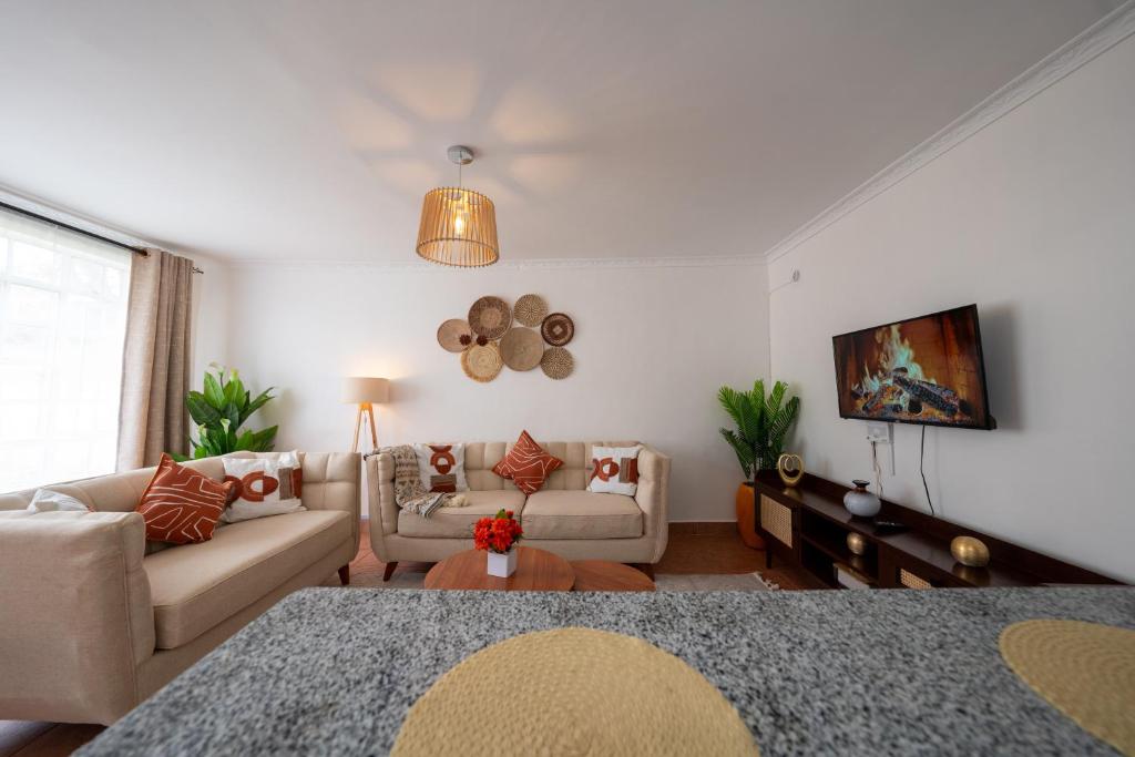 Arabella Ember - Fully Equipped Boho-Chic Apartment in Karen - Tap to explore photos