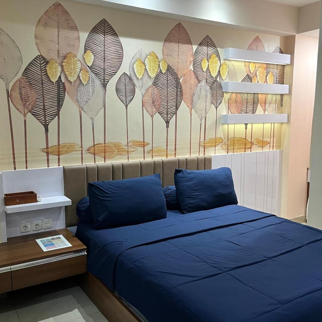 Rooms of Cozy 2 BR Sudirman Suites Apartment