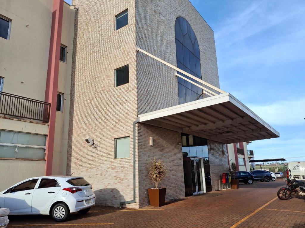 Onix Inn Hotel Cravinhos - Tap to explore photos