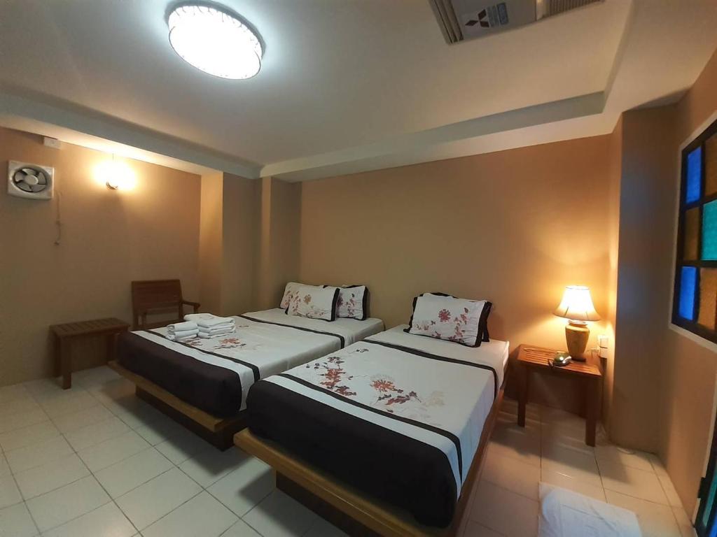Bangkok Travel Suites - Tap to explore photos