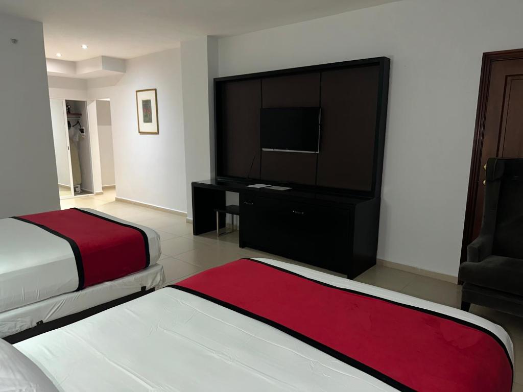 Ramada Santo Domingo Princess Hotel - Tap to explore photos