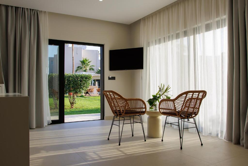 Vergina Apartments & Suites - Tap to explore photos