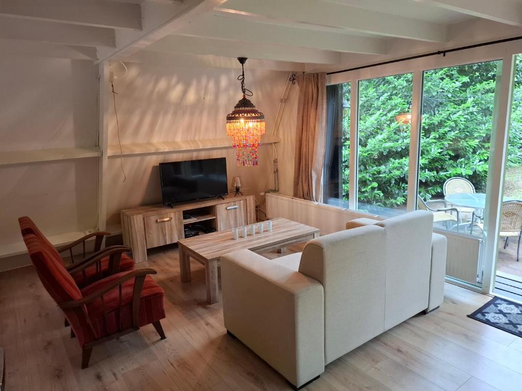 Bosrijk gelegen vakantiehuis met optimale privacy! photo 3