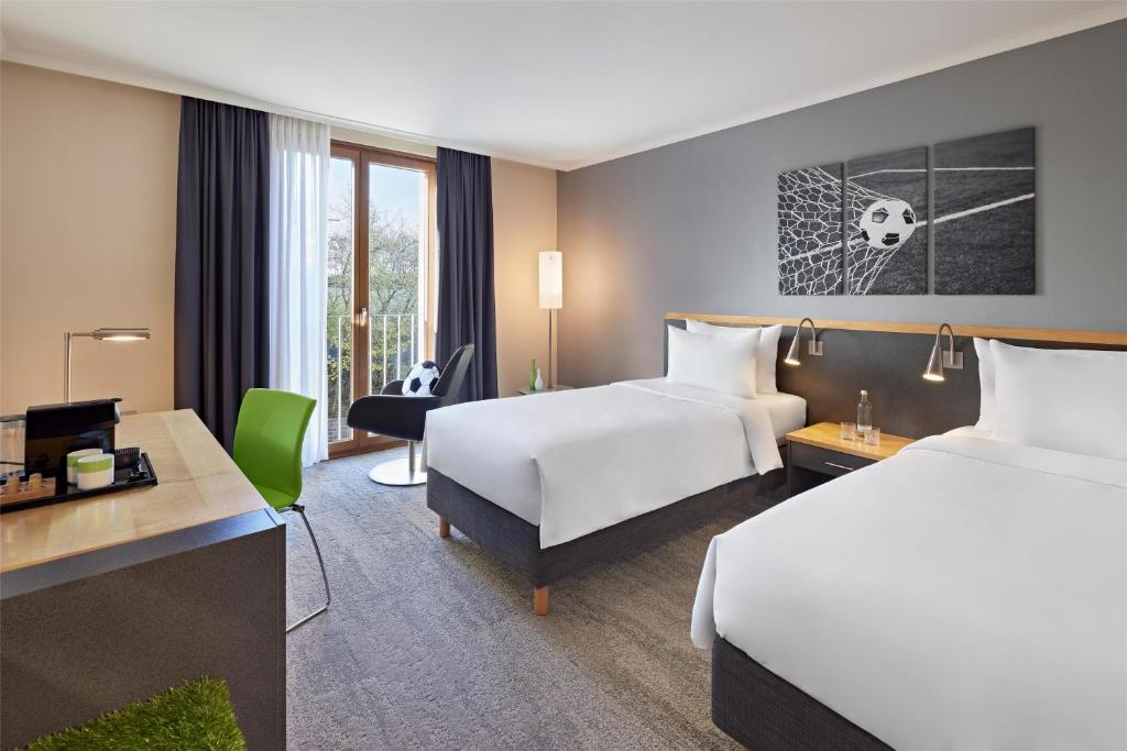 THE CURVE Hotel BayArena Leverkusen - Tap to explore photos