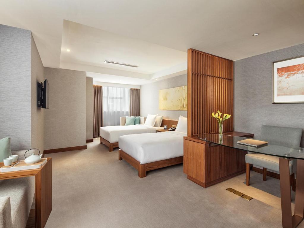 Двухместный (Двухместный номер Делюкс с 2 отдельными кроватями), Deacon House Wuxi