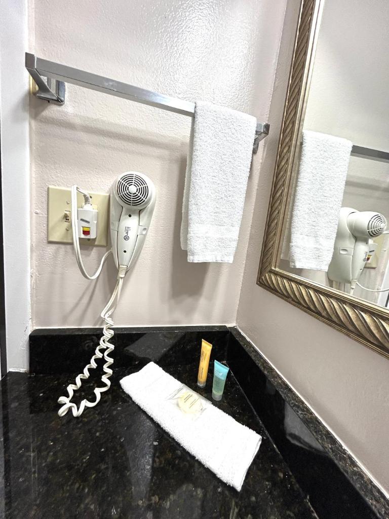 Shining Light Inn & Suites - Tap to explore photos